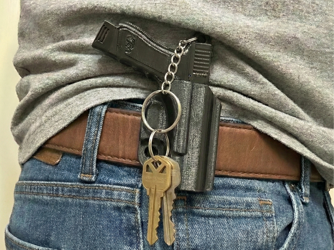 The QuickDraw Keychain - Mini Pistol & Holster